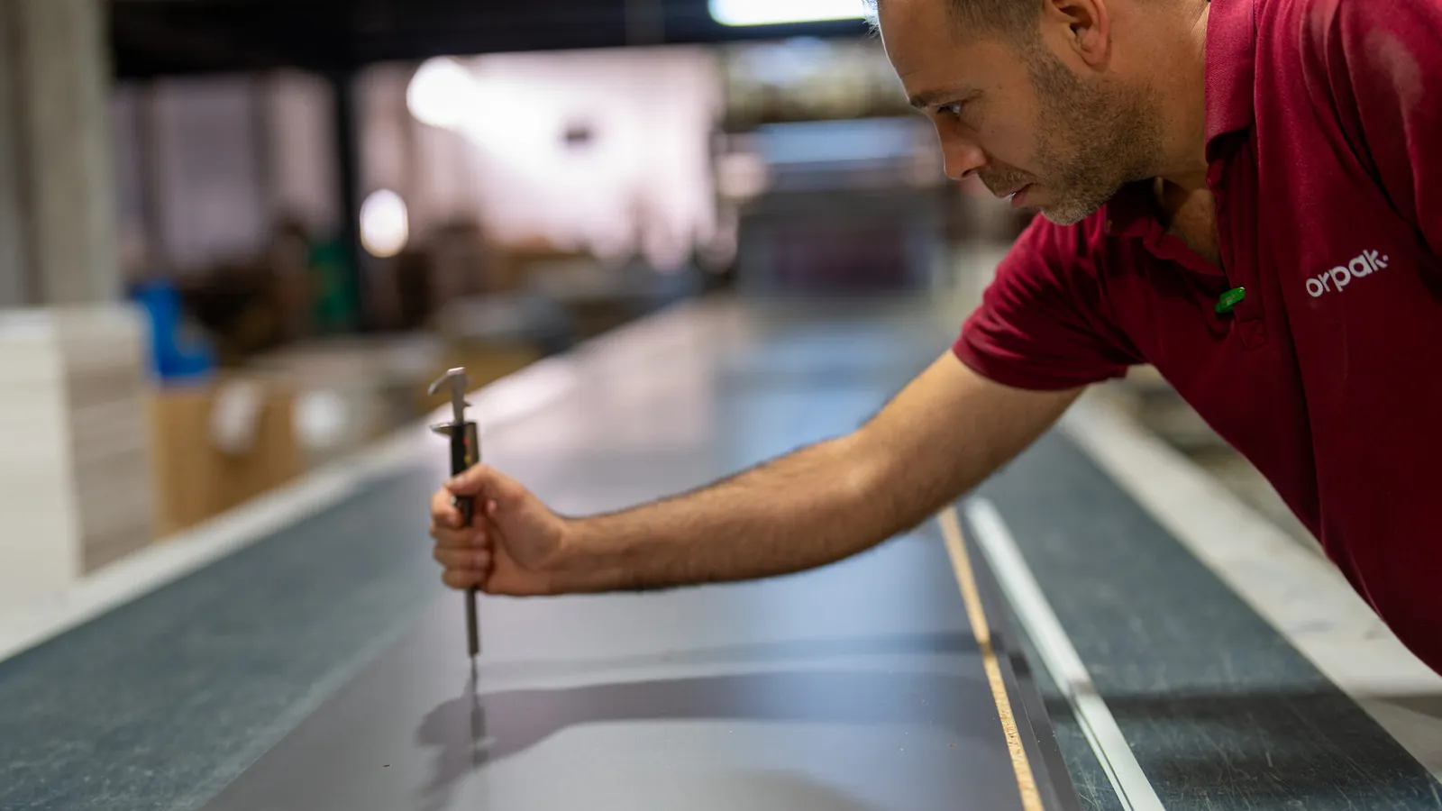 Panel thickness checked with a caliper before the next operation